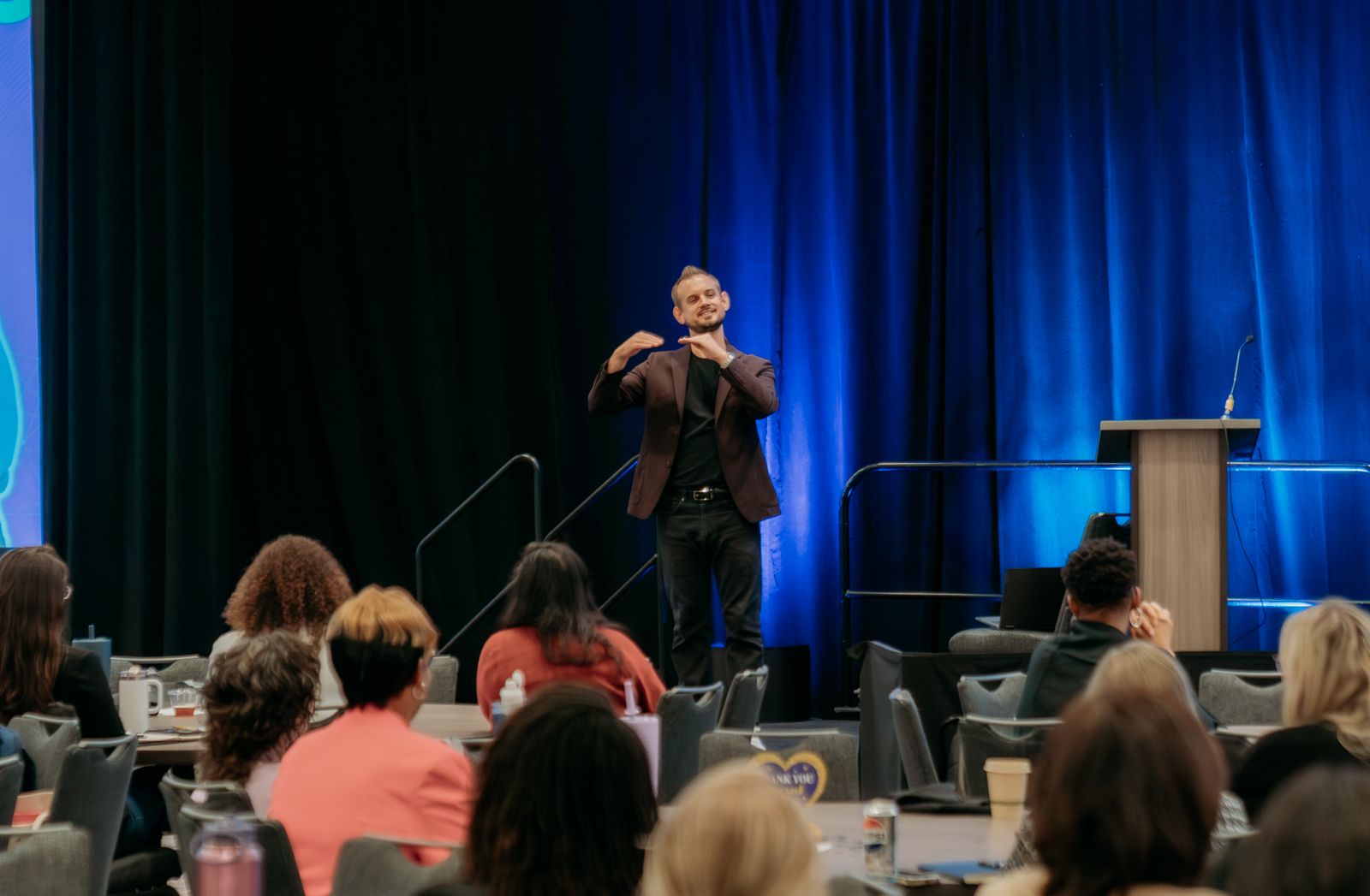 Luke Goetting speaking at a conference