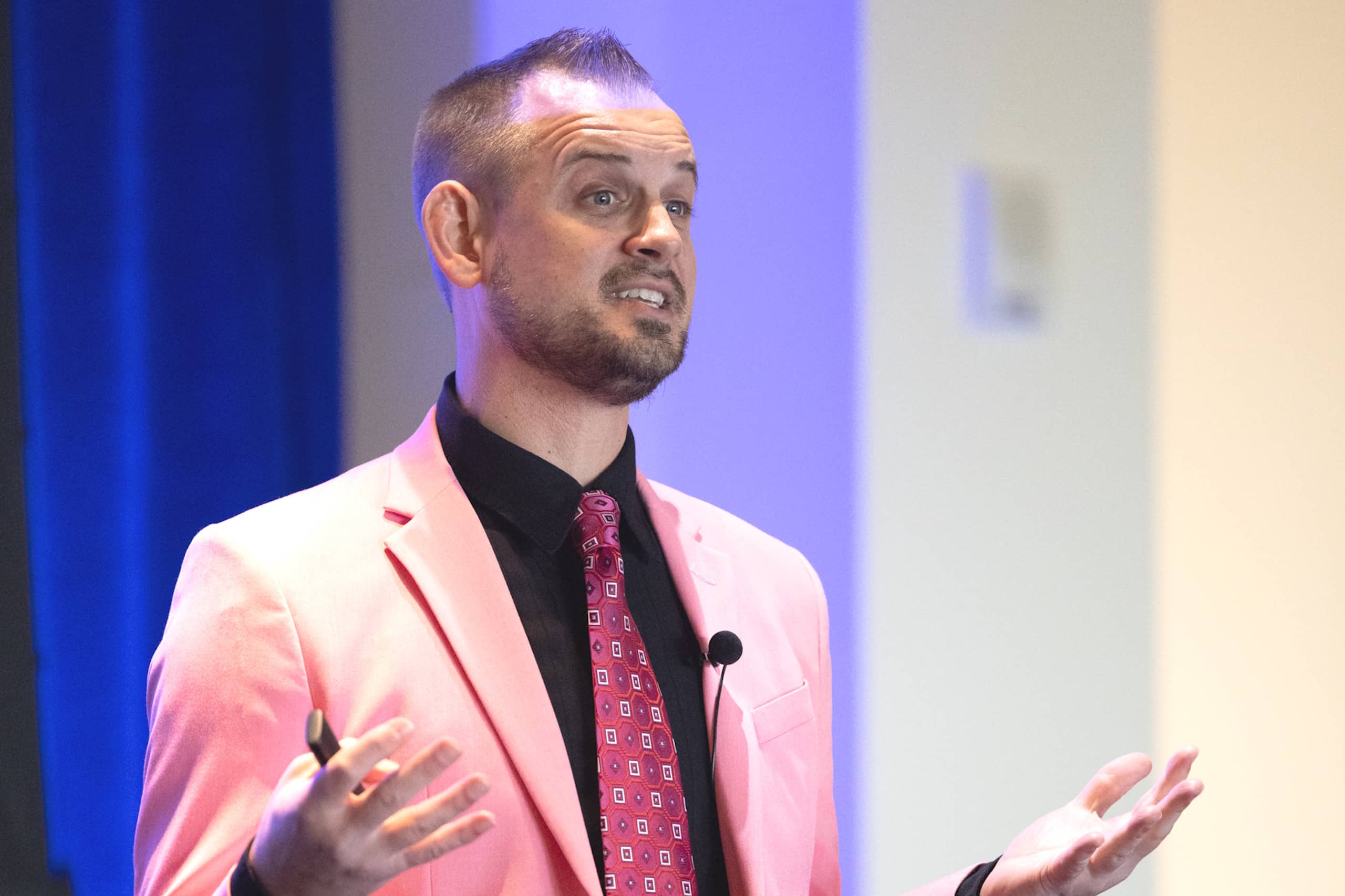 Luke on conference stage