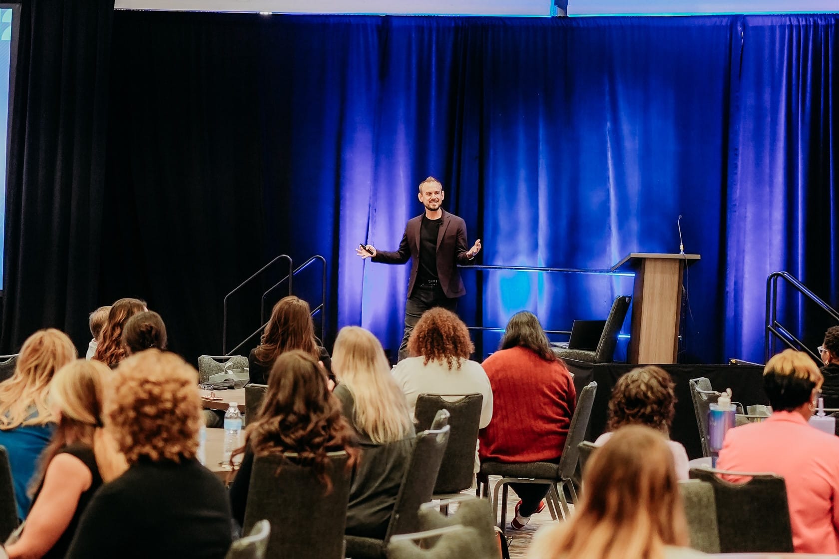 Luke presenting to audience